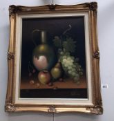 A gilt framed still life study of fruit