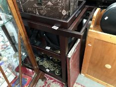 A dark wood 3 shelf trolley with top serving tray