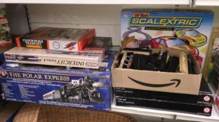 A quantity of assorted children's train sets including Polar Express and 'My First' scalextric set