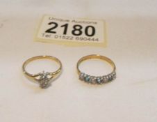 2 9ct gold rings set topaz and small parva diamonds.