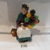 A Royal Doulton figure 'Old Balloon Seller', HN 1315.