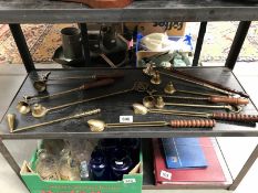 A collection of brass & other candle snuffers