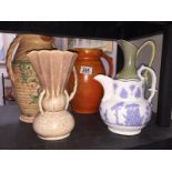 4 jugs and a vase including Barum, Barnstaple, Beswick etc.