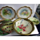A collection of Doulton plates and bowls including handpainted and series ware.