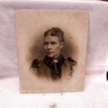 An unframed Victorian portrait photograph on glass.