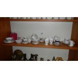 A Royal Doulton miniature porcelain teaset etc.