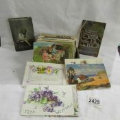 A quantity of vintage post cards.