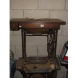 A Singer treadle sewing machine A/F and one similar