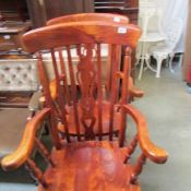 A pair of Windsor chairs.