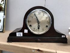 A mantle clock in working order