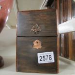 A continental lidded box to take a perfume bottle with embossed plaque on lid.