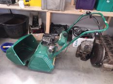 A Qualcast classic petrol 35s lawn mower