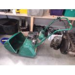 A Qualcast classic petrol 35s lawn mower