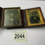 2 miniature Victorian photograph cases containing photographs (Daguerreotypes) of gentlemen.