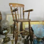 A Victorian child's high chair.