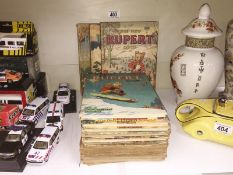 A collection of early Rupert books and annuals in various condition