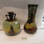 A 19th century tube lined pottery vase by R A Vissant and another vase depicting sailing ships.