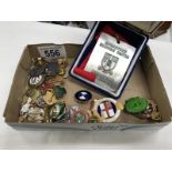 A quantity of assorted badges & a Londonderry marathon medallion