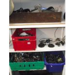 3 shelves of assorted bicycle spares including gears, saddles, peddles etc.