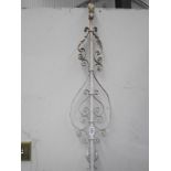 A painted wrought iron shop sign light bracket