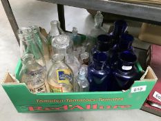 A collection of glassware including Bristol blue, milk bottle & measures etc.