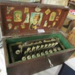 A 19th century Busson Flutina accordion with mother of pearl keys and floral decorated bellows in