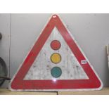 A traffic lights warning triangle sign