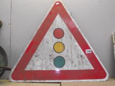 A traffic lights warning triangle sign