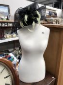 A Mannequin/tailors & hat