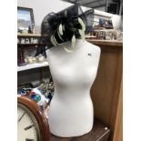 A Mannequin/tailors & hat