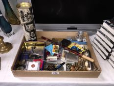 A quantity of assorted collectables including penknives, cigarette cards, cap badges,