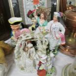 A mixed lot of Victorian Toby jugs and Staffordshire figures (some a/f).