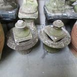 A pair of garden urns.