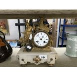 A French figural mantle clock