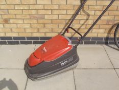 A Flymo Turbo Compact 300 lawn mower