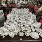 In excess of 300 pieces of Paragon and Star china Tree of Kashmir tea and dinner ware.