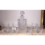 A crystal decanter and 6 glasses
