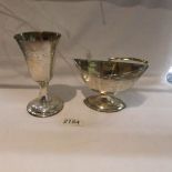 A silver goblet J G C London 1977 and a silver basket R H D N, London 1936.