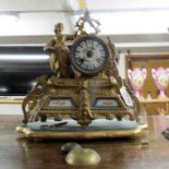 A French gilded and porcelain mantle clock.