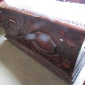 A good George II domed sea chest with carved panels "1753" and "Wobcke Wobbens".