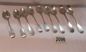 9 silver teaspoons, approximately 160 grams.