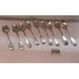 9 silver teaspoons, approximately 160 grams.