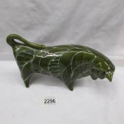 A Trentham Pottery bull by Colin Melbourne in a green glaze.