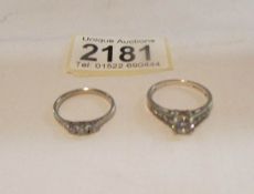 2 stone set silver rings.