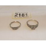 2 stone set silver rings.