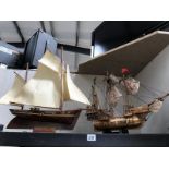 2 model sailing ships