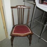 A Victorian child's chair.