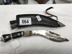 A miniature kukri