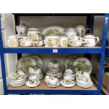 Approximately 70 pieces of Denby dinnerware (2 shelves)