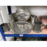 A collection of pewterware including tray,